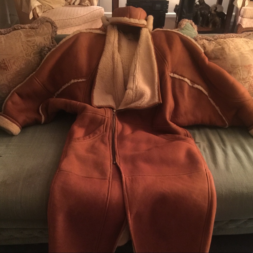 Shearling long coat with matching cap.